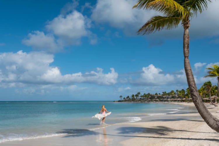 Girl walking along the beach